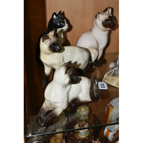 312 - A GROUP OF CERAMIC ANIMAL FIGURES, comprising a Beswick Camargue Wild Horse figure on a ceramic base... 