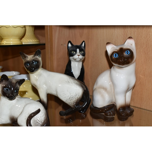 312 - A GROUP OF CERAMIC ANIMAL FIGURES, comprising a Beswick Camargue Wild Horse figure on a ceramic base... 