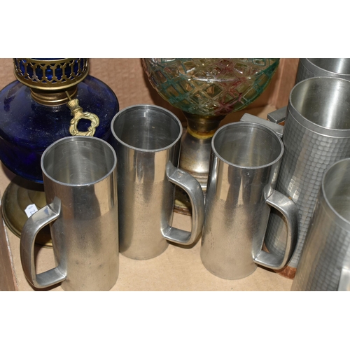 320 - A BOX OF MID TWENTIETH CENTURY PEWTER TANKARDS AND TWO OIL LAMPS, comprising a set of six tankards b... 