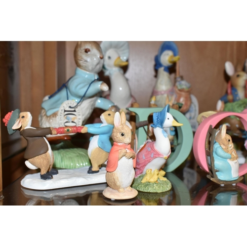 330 - A COLLECTION OF BEATRIX POTTER ORNAMENTS, to include a Beswick Large Peter Rabbit with 100 years bac... 