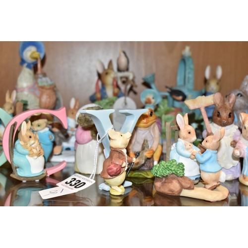 330 - A COLLECTION OF BEATRIX POTTER ORNAMENTS, to include a Beswick Large Peter Rabbit with 100 years bac... 