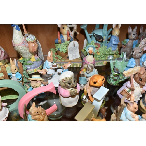 330 - A COLLECTION OF BEATRIX POTTER ORNAMENTS, to include a Beswick Large Peter Rabbit with 100 years bac... 