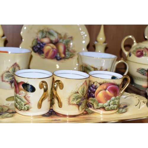 340 - THIRTY EIGHT PIECES OF AYNSLEY ORCHARD GOLD TEA AND DINNER WARES, to include a tea for one teapot, c... 