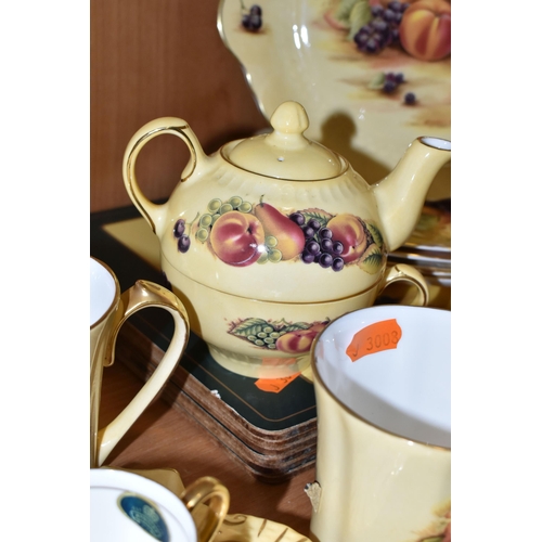 340 - THIRTY EIGHT PIECES OF AYNSLEY ORCHARD GOLD TEA AND DINNER WARES, to include a tea for one teapot, c... 