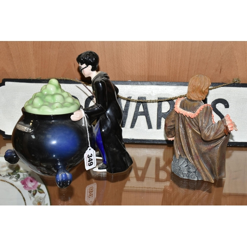 349 - A HARRY POTTER COOKIE JAR,  Harry Potter standing next to a large bubbling cauldron, wand in hand, m... 