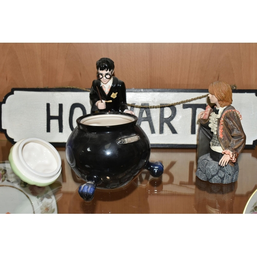 349 - A HARRY POTTER COOKIE JAR,  Harry Potter standing next to a large bubbling cauldron, wand in hand, m... 