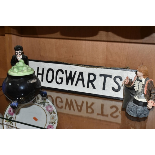 349 - A HARRY POTTER COOKIE JAR,  Harry Potter standing next to a large bubbling cauldron, wand in hand, m... 