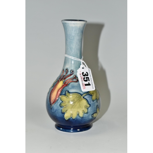 351 - A MOORCROFT POTTERY 'COLUMBINE' PATTERN BUD VASE, yellow and pink flowers on a blue ground, impresse... 