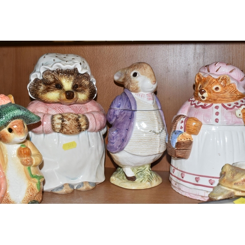 364 - A GROUP OF BEATRIX POTTER CHARACTER COOKIE JARS AND CERAMICS, comprising four cookie jars a 'Sigma' ... 