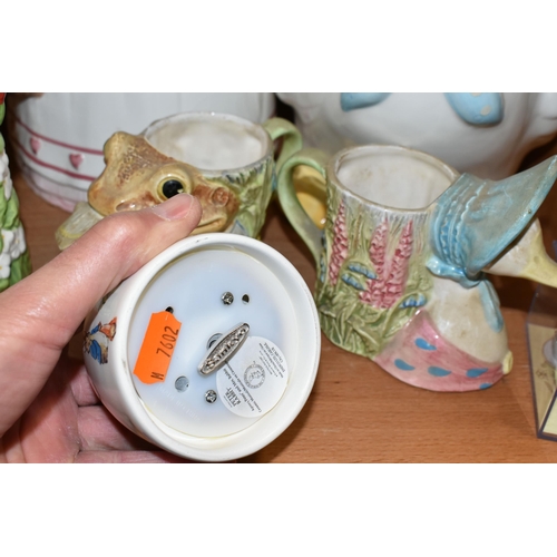 364 - A GROUP OF BEATRIX POTTER CHARACTER COOKIE JARS AND CERAMICS, comprising four cookie jars a 'Sigma' ... 