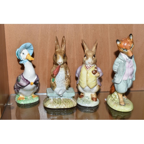 372 - A COLLECTION OF BESWICK BEATRIX POTTER'S CHARACTER FIGURINES, comprising Jemima Puddle-Duck, Peter R... 