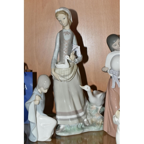 380 - FOUR LLADRO FIGURES, comprising Girl With Goose no 4815, sculptor V Martinez, issued 1972-1991, heig... 