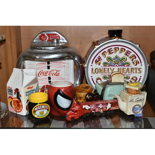 383 - A COLLECTION OF CERAMIC COOKIE JARS AND NOVELTY TEAPOTS, comprising an official Beatles Merchandise ... 