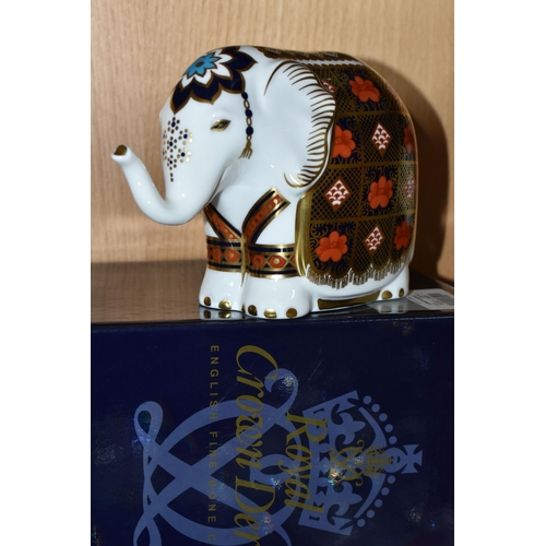 389 - A BOXED ROYAL CROWN DERBY ELEPHANT, with gold stopper, Condition Report: good condition