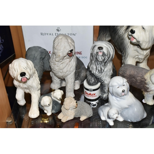 393 - EIGHT OLD ENGLISH SHEEP DOG SCULPTURES, comprising Royal Doulton Dulux dog with box, approximate hei... 