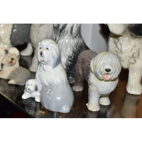 393 - EIGHT OLD ENGLISH SHEEP DOG SCULPTURES, comprising Royal Doulton Dulux dog with box, approximate hei... 