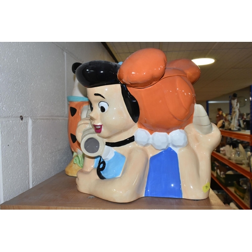 396 - FIVE CARTOON THEMED COOKIE JARS, comprising Fred Flintstone, Betty and Wilma, Tom & Jerry, Scooby Do... 