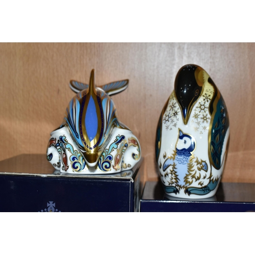 401 - TWO BOXED ROYAL CROWN DERBY 21st ANNIVERSARY PAPERWEIGHTS, comprising a striped Dolphin with gold an... 