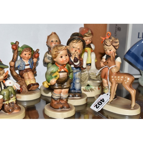 402 - NINE HUMMEL / GOEBEL CHILD FIGURES, comprising Goose girl, Play Mates, Trumpet Boy, Soloist, Apple T... 