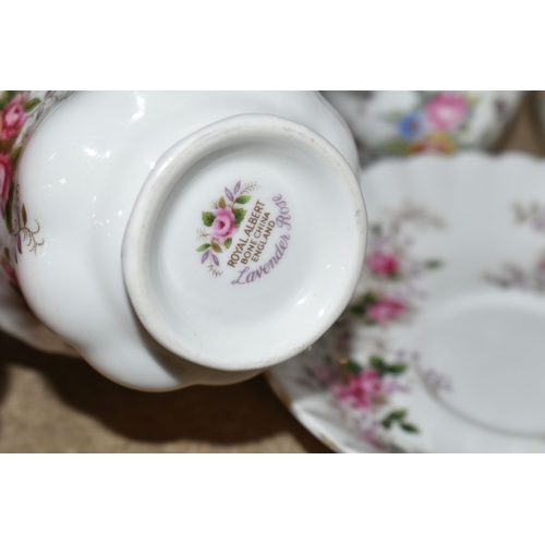 414 - A GROUP OF TEAWARE AND TWO MANTEL CLOCKS, to include a Royal Albert Lavender Rose teacup and saucer ... 