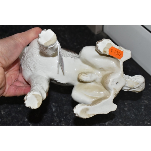 433 - A NYMPHENBURG PORCELAIN FIGURE OF A SEATED FOX TERRIER, impressed no's 628 5, impressed shield mark,... 