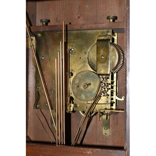 434 - AN EARLY 20TH CENTURY WALNUT CASED CHIMING BRACKET CLOCK, the caddy hood with foliate carved detail,... 