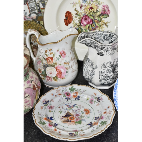 435 - A GROUP OF 19TH AND 20TH CENTURY JUGS, PLATES AND CHARGERS, comprising a Sunderland lustre jug mould... 