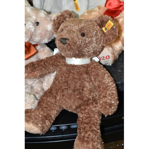 436 - THREE STEIFF YEAR BEARS 2020-2022 AND A STEIFF SOFT AND CUDDLY FRIENDS 'HOPPIE', all with buttons in... 