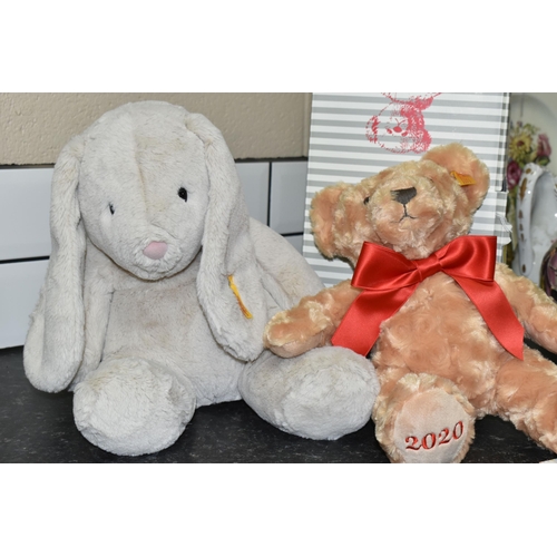 436 - THREE STEIFF YEAR BEARS 2020-2022 AND A STEIFF SOFT AND CUDDLY FRIENDS 'HOPPIE', all with buttons in... 