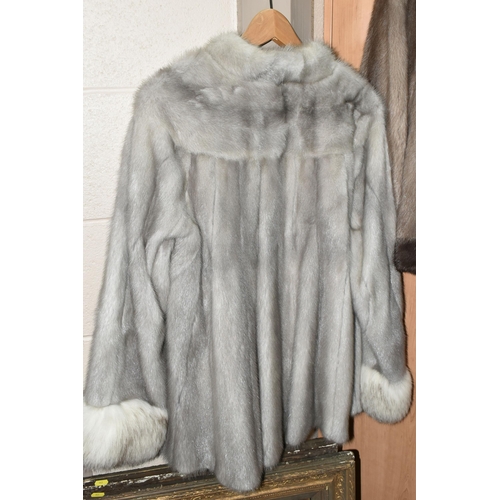 442 - THREE LADIES' FUR COATS, comprising a silver fur example with white fur cuffs, and a brown for examp... 