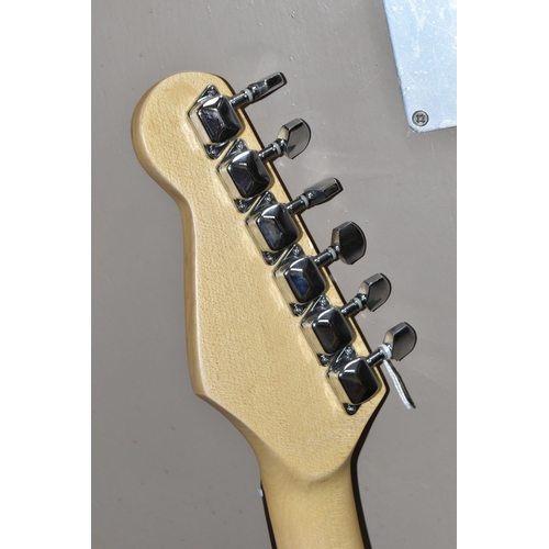 445 - AN ELECTRIC STRATOCASTER STYLE GUITAR, indistinct signature to the headstock, together with a Hokada... 