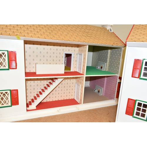 470 - TWO WOODEN DOLL'S HOUSES, modelled as a detached house with side garage, front opening, no furniture... 