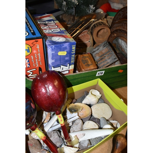 478 - TWO BOXES OF TREEN AND SUNDRIES, to include a collection of seashells, wooden serving trays, two tab... 