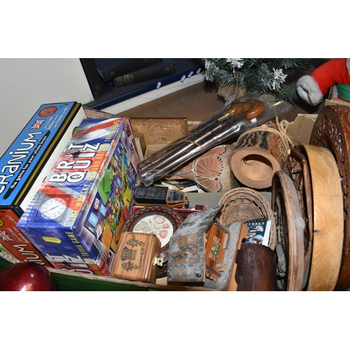 478 - TWO BOXES OF TREEN AND SUNDRIES, to include a collection of seashells, wooden serving trays, two tab... 