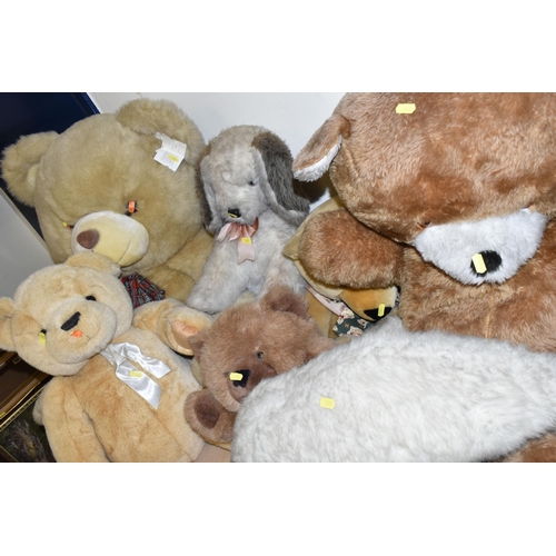 482 - A LARGE QUANTITY OF TEDDY BEARS AND SOFT TOYS, to include a Marks & Spencer 'Winnie The Pooh' hot wa... 