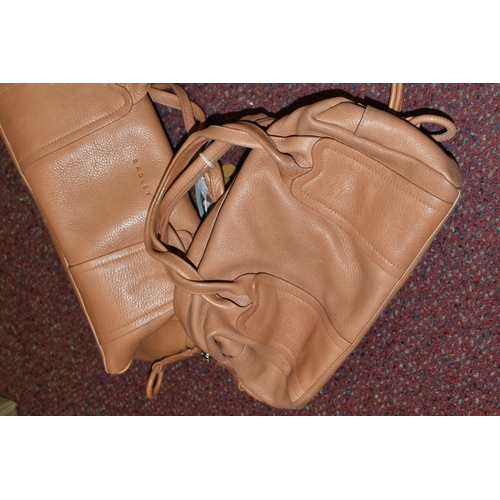 483 - TWO TAN COLOURED RADLEY HANDBAGS, approximate widths 26cm and 36cm, Condition Report: both appear to... 