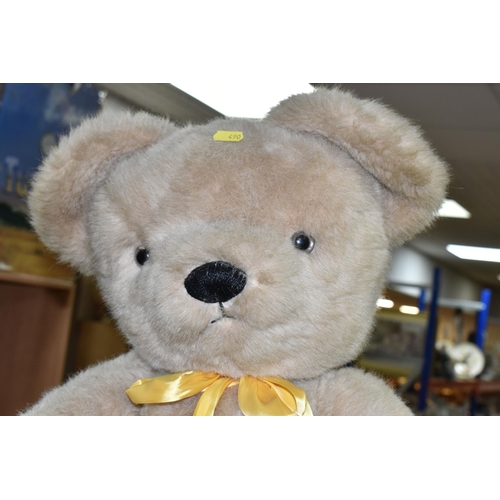 494 - A LARGE MERRYTHOUGHT CHAMPAGNE PLUSH BEAR, plastic eyes, vertically stitched nose, jointed body, lab... 