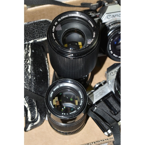 520 - VINTAGE CANON PHOTOGRAPHIC EQUIPMENT, comprising two Canon AE-1 35mm SLR camera bodies, a Canon 50mm... 