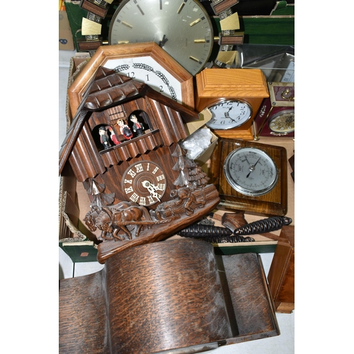 531 - A BOX AND LOOSE CLOCKS AND BAROMETER, including a modern cuckoo clock fitted with Reuge musical move... 