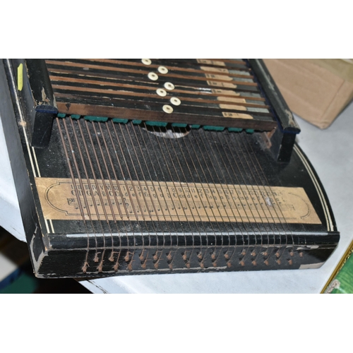 542 - AN EARLY 20TH CENTURY AUTO HARP AND A BOX OF MUSICAL INSTRUMENTS, including a boxed Hero chromatic h... 