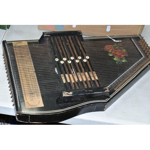 542 - AN EARLY 20TH CENTURY AUTO HARP AND A BOX OF MUSICAL INSTRUMENTS, including a boxed Hero chromatic h... 