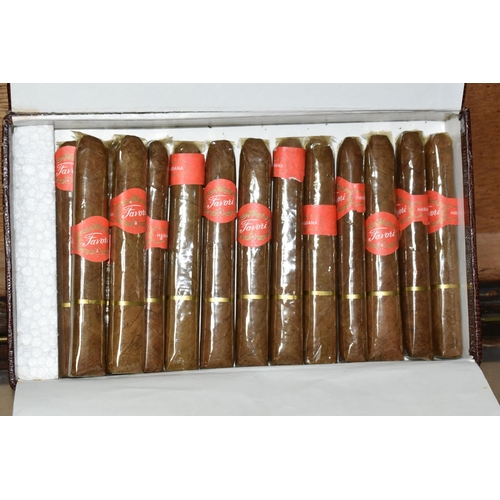 547 - A BOXED TOP HAT from Woodrow, Manchester and a H. Upmann Cigar case with a box of fourteen Favori ha... 