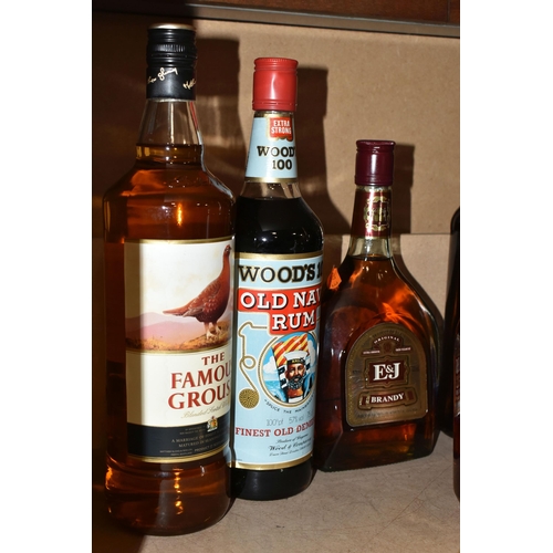 207 - A COLLECTION OF  ALCOHOL comprising one 1L bottle of The Famouse Grouse Blended Scotch Whisky, three... 