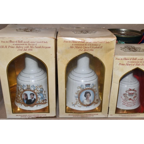 211 - NINE BELL'S WHISKY COMMEMORATIVE DECANTERS comprising The Wedding of HRH Prince Charles to Lady Dian... 