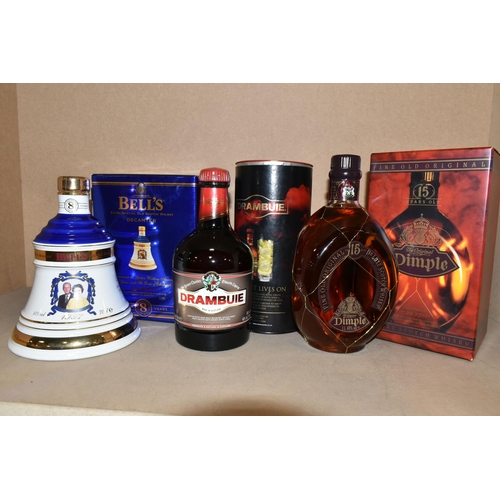 214 - WHISKY & LIQUEUR, Three Bottles comprising one bottle of The Original Dimple De Luxe Scotch Whisky, ... 