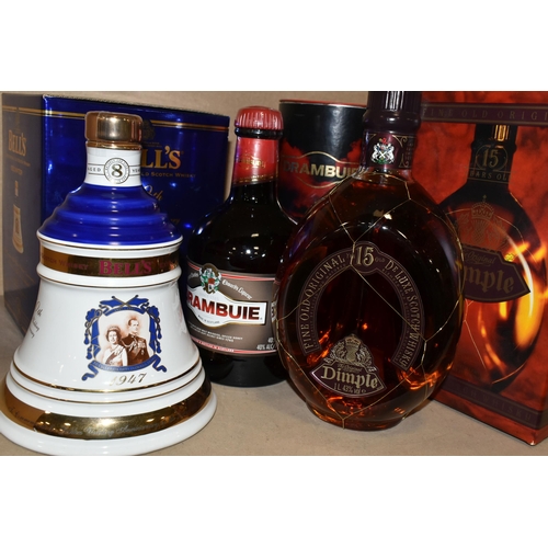 214 - WHISKY & LIQUEUR, Three Bottles comprising one bottle of The Original Dimple De Luxe Scotch Whisky, ... 