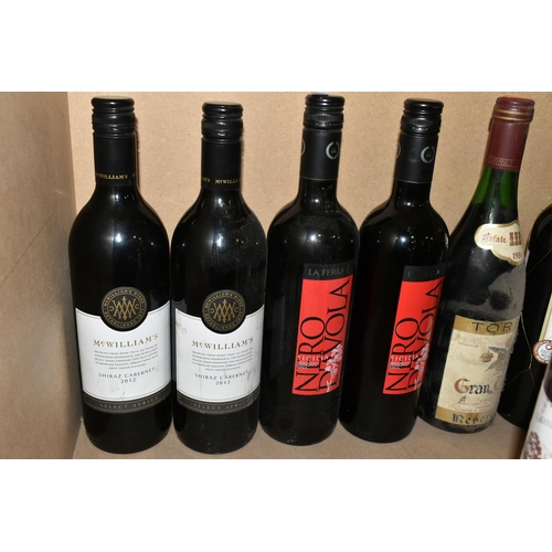 215 - WINE, Twenty-nine bottles of assorted wine comprising one bottle of CHATEAU TOUR ST. BONNET 1999 Cru... 