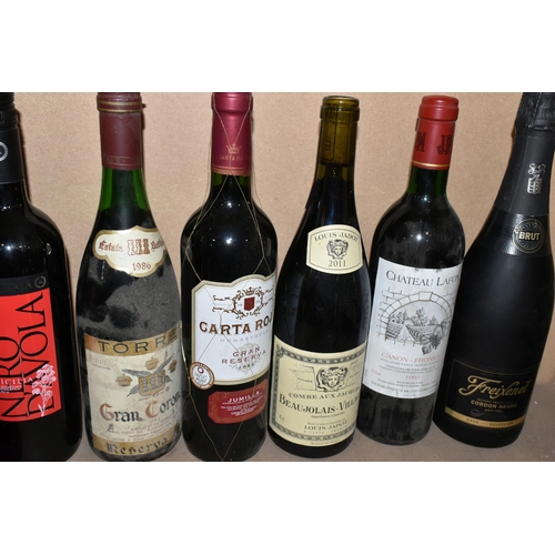 215 - WINE, Twenty-nine bottles of assorted wine comprising one bottle of CHATEAU TOUR ST. BONNET 1999 Cru... 