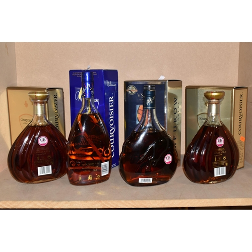 217 - FOUR BOTTLES OF COGNAC comprising two bottles of Courvoisier XO Cognac, 40% vol. 70cl boxed, one bot... 