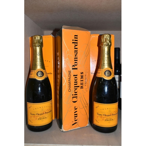 247 - THREE BOTTLES OF  VEUVE CLICQUOT PONSARDIN CHAMPAGNE, one 1960's bottling, 26 fl.oz, two bottles 750... 